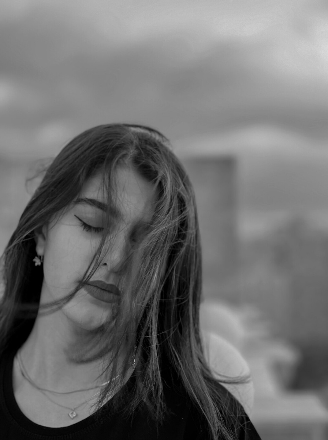 Portrait of a woman with long hair smiling