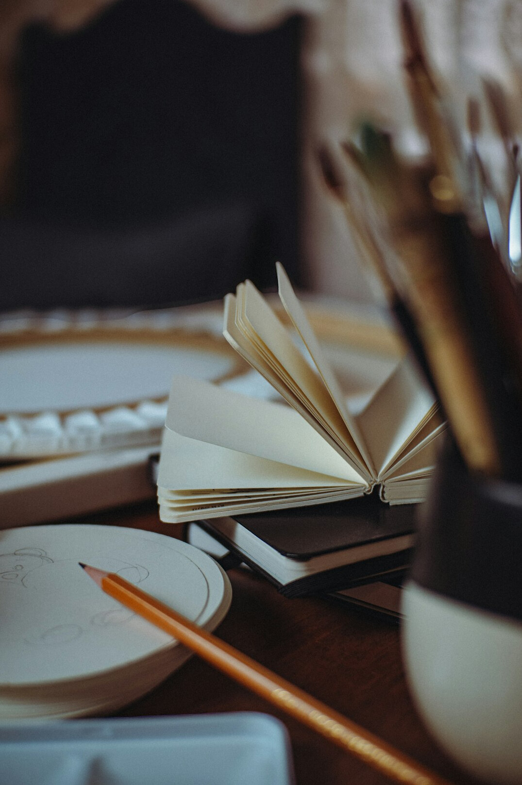 Notebook and pen on a desk during a workshop